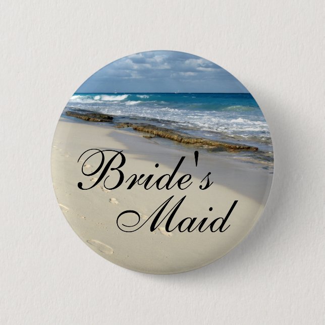 fotspår i sanden knäppas knapp (Framsida)