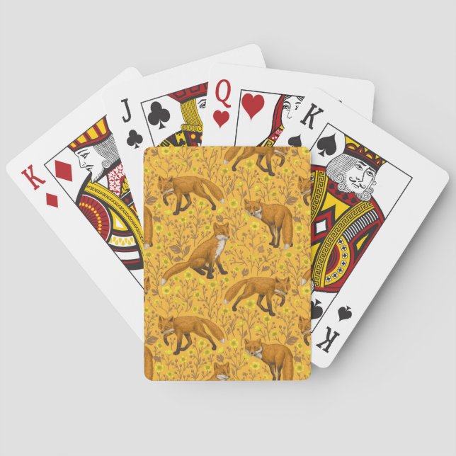Foxar och fjärilar på orangen casinokort (Baksidan)