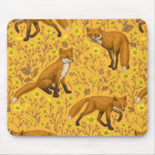 Foxar och fjärilar på orangen musmatta