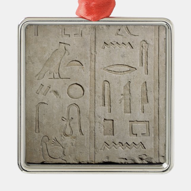 Fragment av en hieroglyphic inskrift julgransprydnad metall (Framsidan)