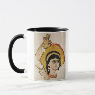 Fragment av en tapestry som visar huvudet av en mugg