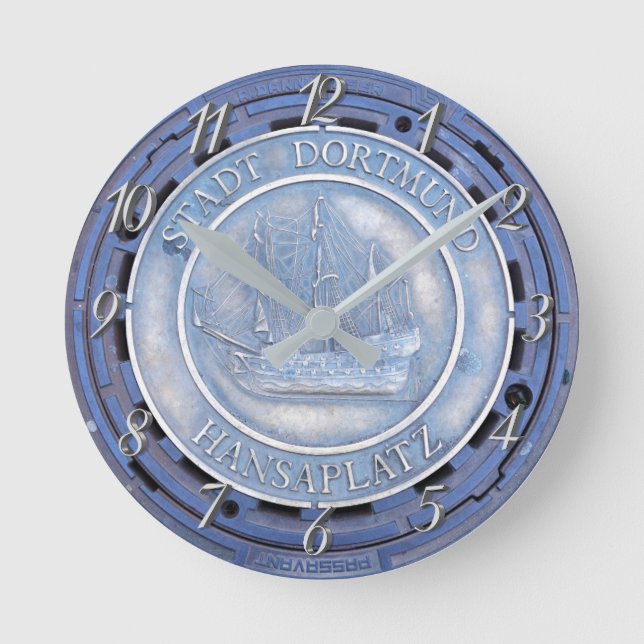 Frakt för german i manhålsluckor rund klocka (Framsida)