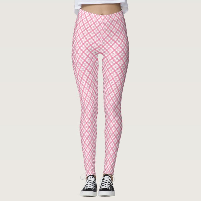 Fram- och baksida av rosa rutiga leggings iförd  (Framsida)