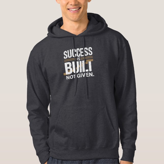 Framgång byggs, inte ges Motivationscitat Hoodie (Framsida)