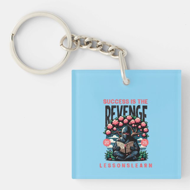 Framgång Hämnd LÄRDOMAR AKRYLNYCKELRING (Framsidan)