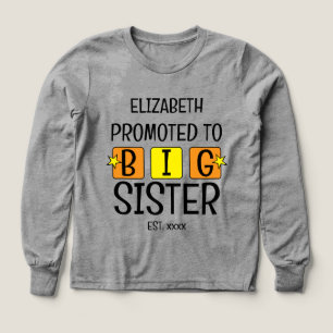 Främjad till storasyster namn förra orangens gult t shirt