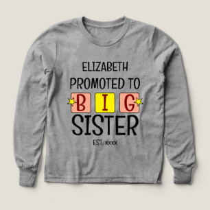 Främjad till storasyster namn:s gult för fjolårets t shirt