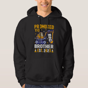 Främjad till storebror 2023 års annonskonstruktion hoodie