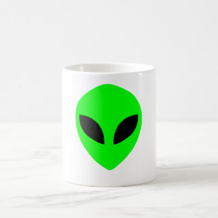 främmande ansiktemugggrönt kaffemugg