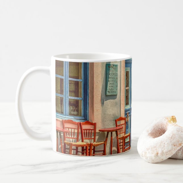 Framme av den grekiska cafen kaffemugg (Med munk)
