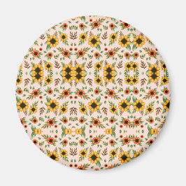 Framsidan av en rund knapp med en färgrik blomster magnet