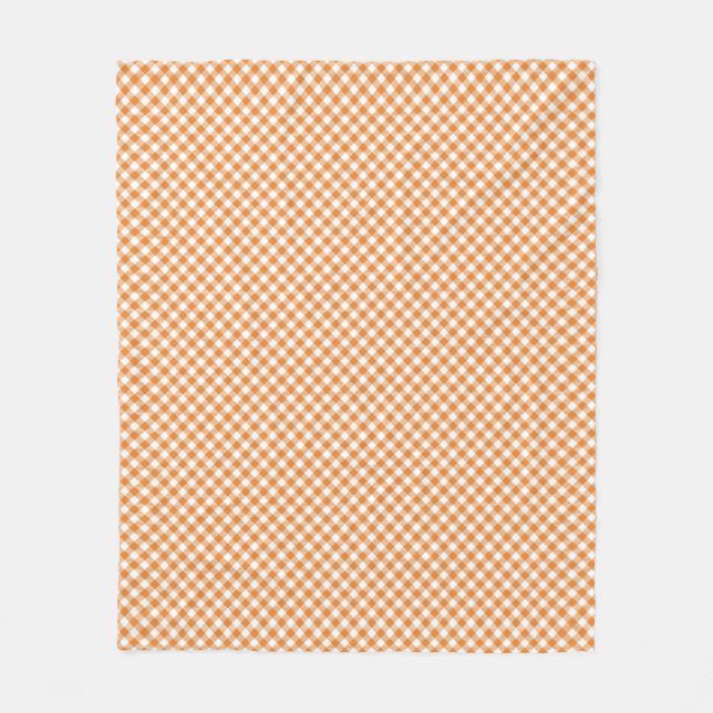 Framsidan har ett brunt och vitt gingham-mönster  fleecefilt (Framsidan)