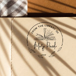 Från The Library Of Leaves Bokmärke Bok Stämpel<br><div class="desc">Denna eleganta stämpel i trä har en handritad bokillustration och en ram av botaniska blad. Det finns en rund ram runt området som bladmönstret inte täcker. Inuti den botaniska ramen står "Från bibliotek hos" skrivet högst upp i form av böjd text. Ditt anpassade namn står längst ner i ett modernt,...</div>