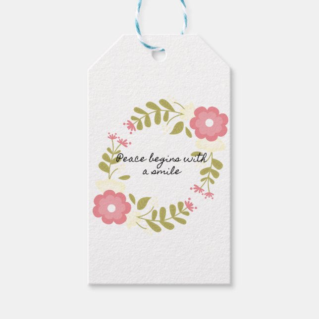 Fred börjar med en leende rosa blommigt presentetikett (Framsidan)