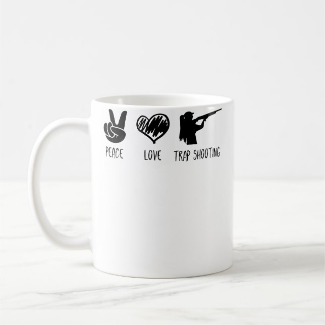 Fred kärlek och lerduveskytte kaffemugg (Vänster)