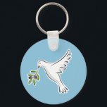 Fredduva med oliv gren nyckelring<br><div class="desc">En vacker vit duva som bär en oliv gren på blå bakgrund. En klassisk symbol för fred.</div>