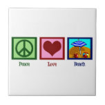 Fredkärlekstrand Kakelplatta<br><div class="desc">En fredstecken,  hjärta och en gullig strand.</div>