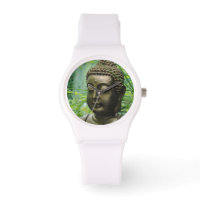 Fredlig Buddha-staty i en Grönt av läder