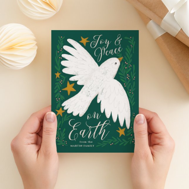 Fredsduva har visat upp julkort (illustrated white peace dove and berry branches green Christmas card "joy & peace on earth")
