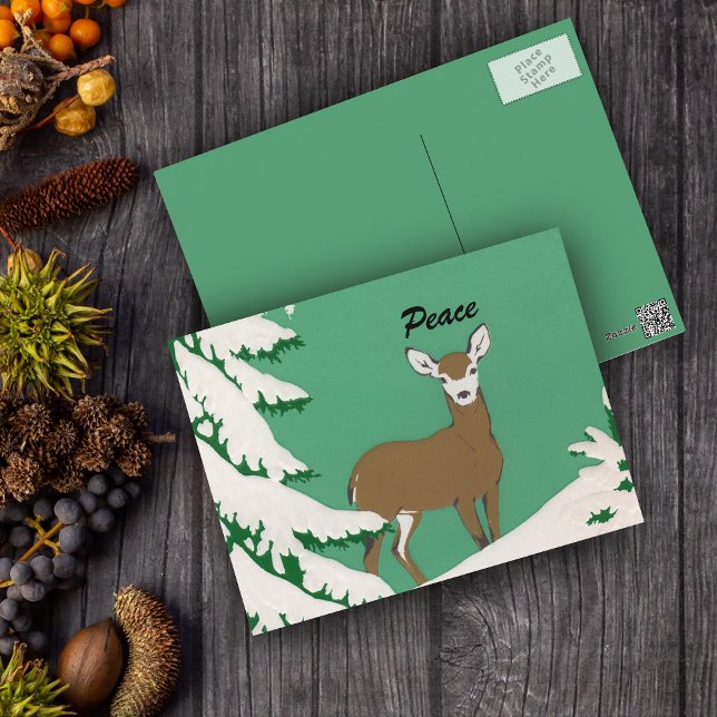 Fredsscenen Hjort Snö Winter Vykort (Brown female deer white face in snow by pine tree on mint green postcard.)