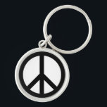 Fredssymbolen svart vit anti-Krig modern enkel, en Rund Silverfärgad Nyckelring<br><div class="desc">Fredssymbol mot svart och vit modern,  enkel nyckelkedja i Krig. Finns i olika former.</div>