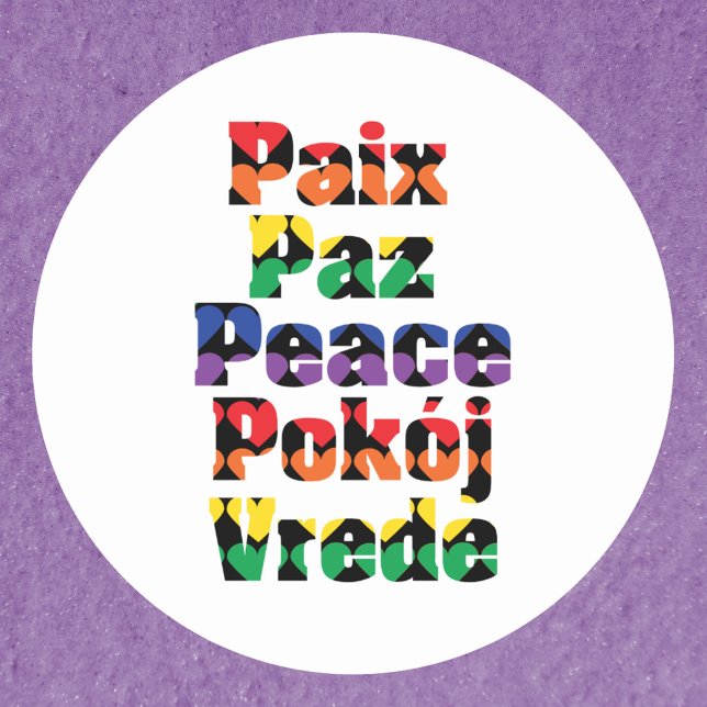 Fredstypografi - regnbågsfart runt klistermärke (A colorful sticker that says peace in English, French, Spanish, Dutch and Polish)