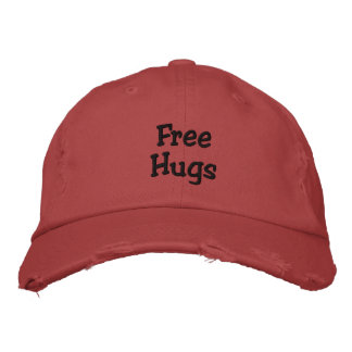 "Free Hugs"-tak Broderad Keps