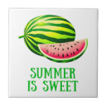 Fresh, Ripe Watermelon with Summer Vibes Kakelplatta<br><div class="desc">Ceramic tile in a whole watermelon accompanied by a juicy red slice dotted with black seeds. Below the fruit,  bold green text reads “SUMMER IS SWEET, ” evoking the refreshing,  sugary delight of watermelon as a quintessential summer treat.</div>