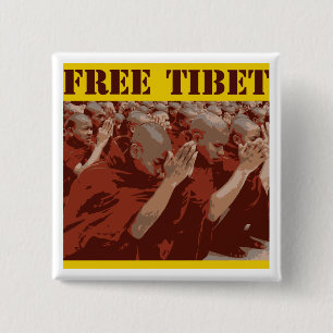 Fria Tibet buddistiska munkar knäppas Knapp