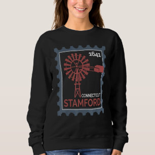 Frimärke med en gammal vindturbin i Stamford T Shirt