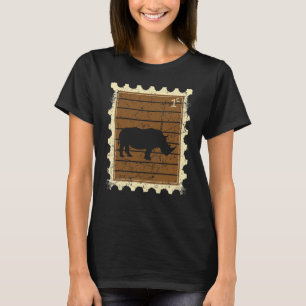 Frimärke med en noshörning t shirt