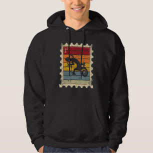 Frimärke med en solnedgångsgecko hoodie