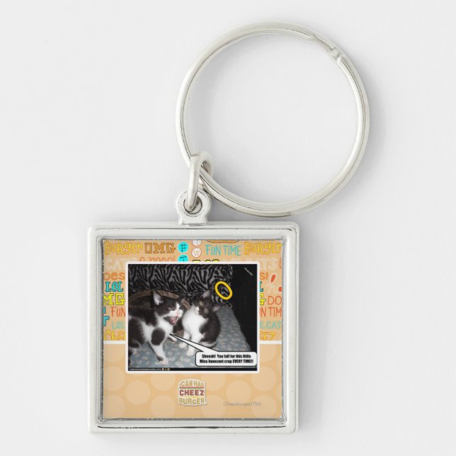 Fröcken oskyldig fyrkantig silverfärgad nyckelring (Framsidan)