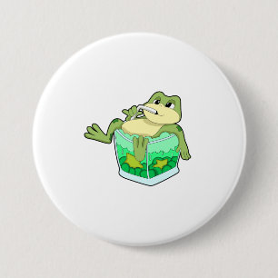 Frog med glas av saft knapp