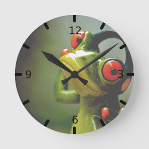 Frog med hörlurar rund klocka