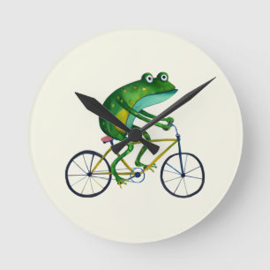 Frog på cykel rund klocka