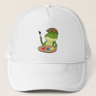 Frog som målarfärg med pensel och färg keps