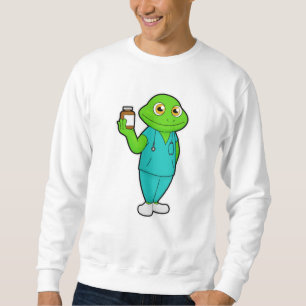 Frog som sjuksköterska med medicin och stetoscope lång ärmad tröja