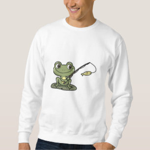 Frog vid fiske med fiskstav lång ärmad tröja