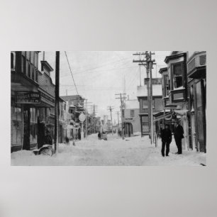 Front Street i Nome, Alaska täckt med snö Poster