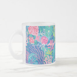 Frostad glasmugg i stilren grafik