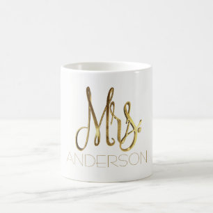 Fru tillfogar guld- elegant typografi för känd kaffemugg