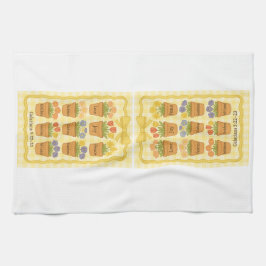 Frukt av blomkrukor av gult av spritdrycker kökshandduk