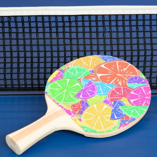 Fruktiga tuttiofärgade fruktskivor pingisracket (Insitu)