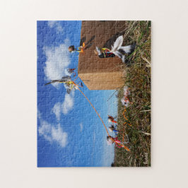 Fubby's die spelen met veren en vliegen. pussel