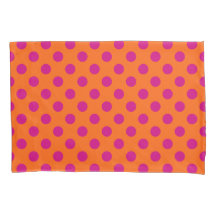 Fuchsia polka dots på orange