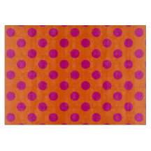 Fuchsia polka dots på orange