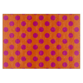 Fuchsia polka dots på orange