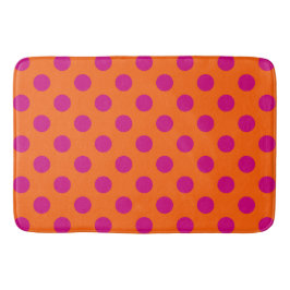 Fuchsia polka dots på orange badrumsmatta