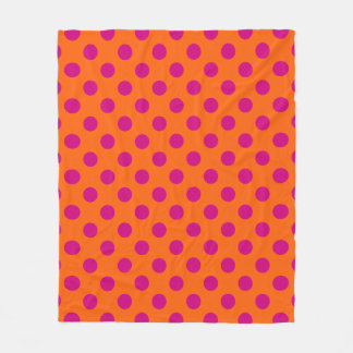 Fuchsia polka dots på orange fleecefilt